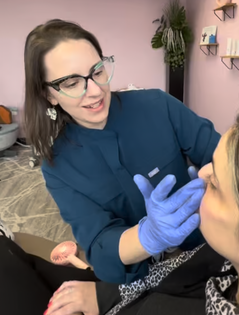 Renee Storm consulting with an aesthetics patient at Storm Wellness Northwest